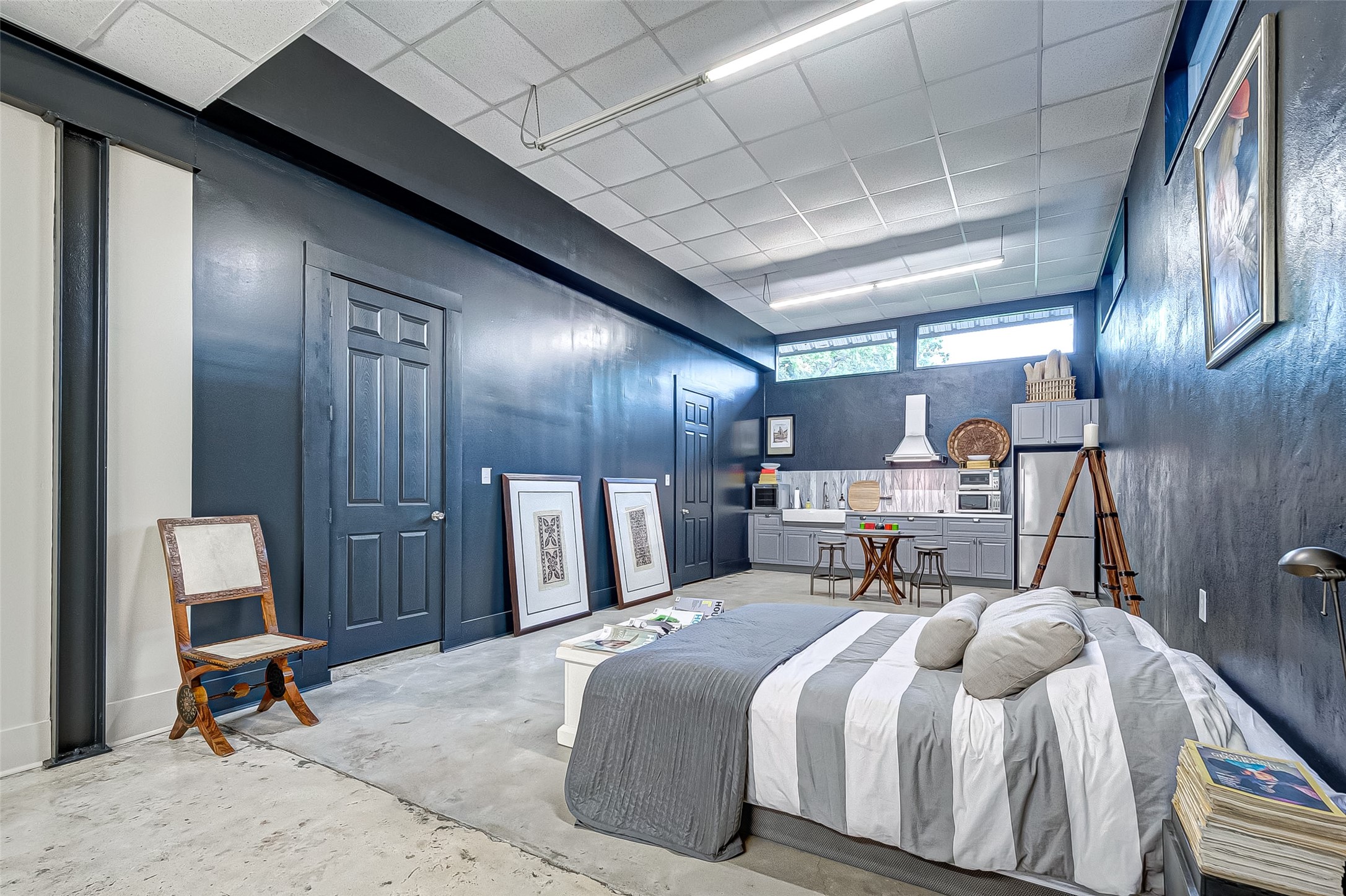 1612 West Alabama Street, Unit ABCD Houston, TX 77006 - Photo 3 of 50 a bed room with a bed and a chair