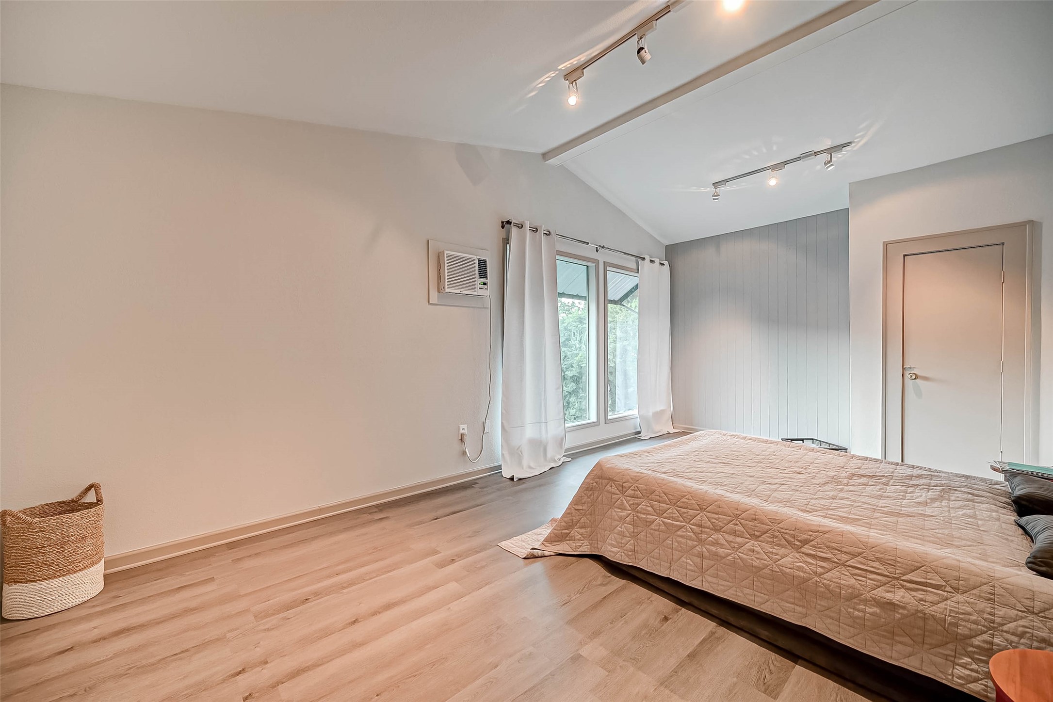 1612 West Alabama Street, Unit ABCD Houston, TX 77006 - Photo 30 of 50 a bedroom with a bed and wooden floor