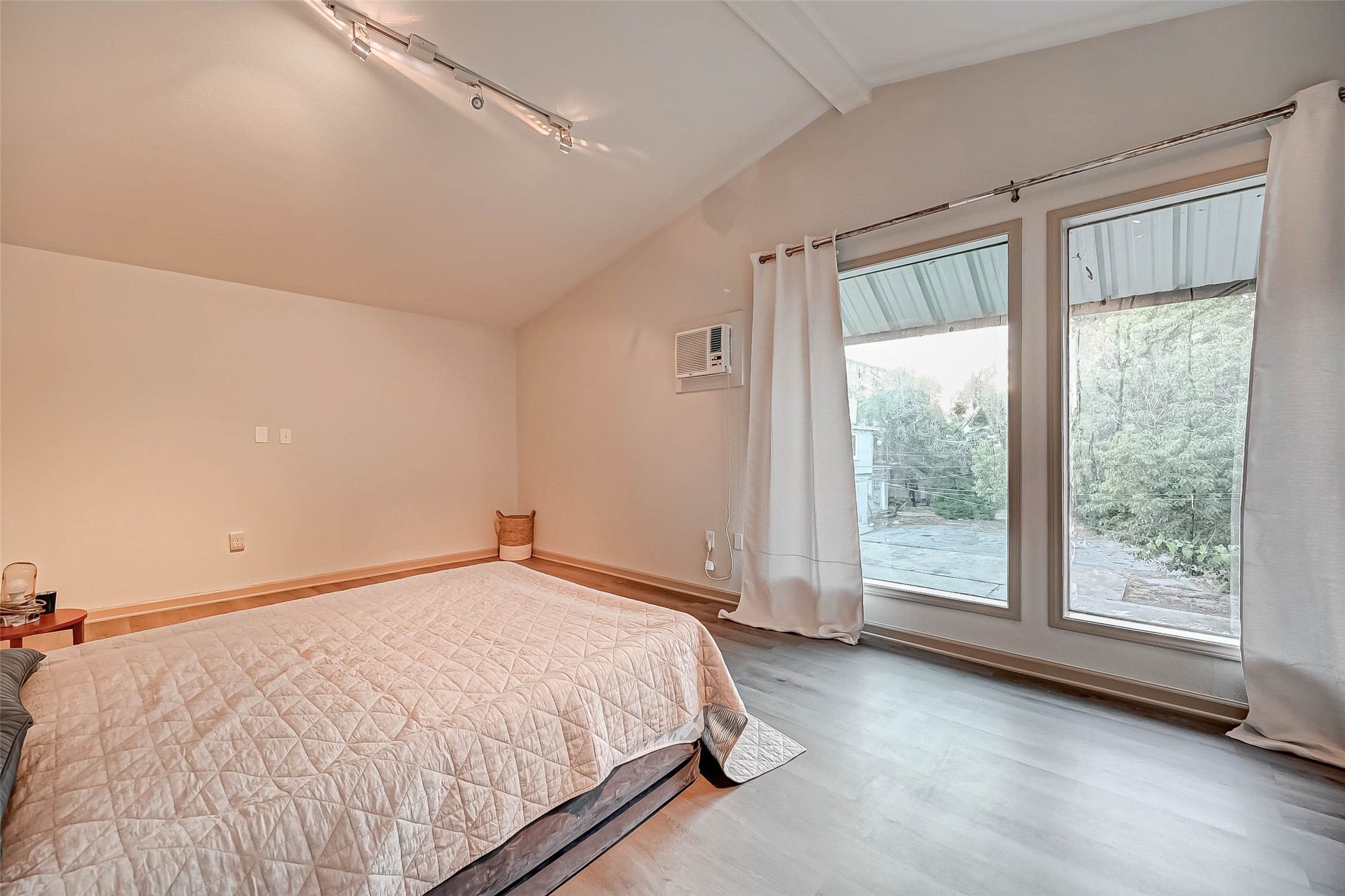 1612 West Alabama Street, Unit ABCD Houston, TX 77006 - Photo 31 of 50 a view of a bedroom with large windows