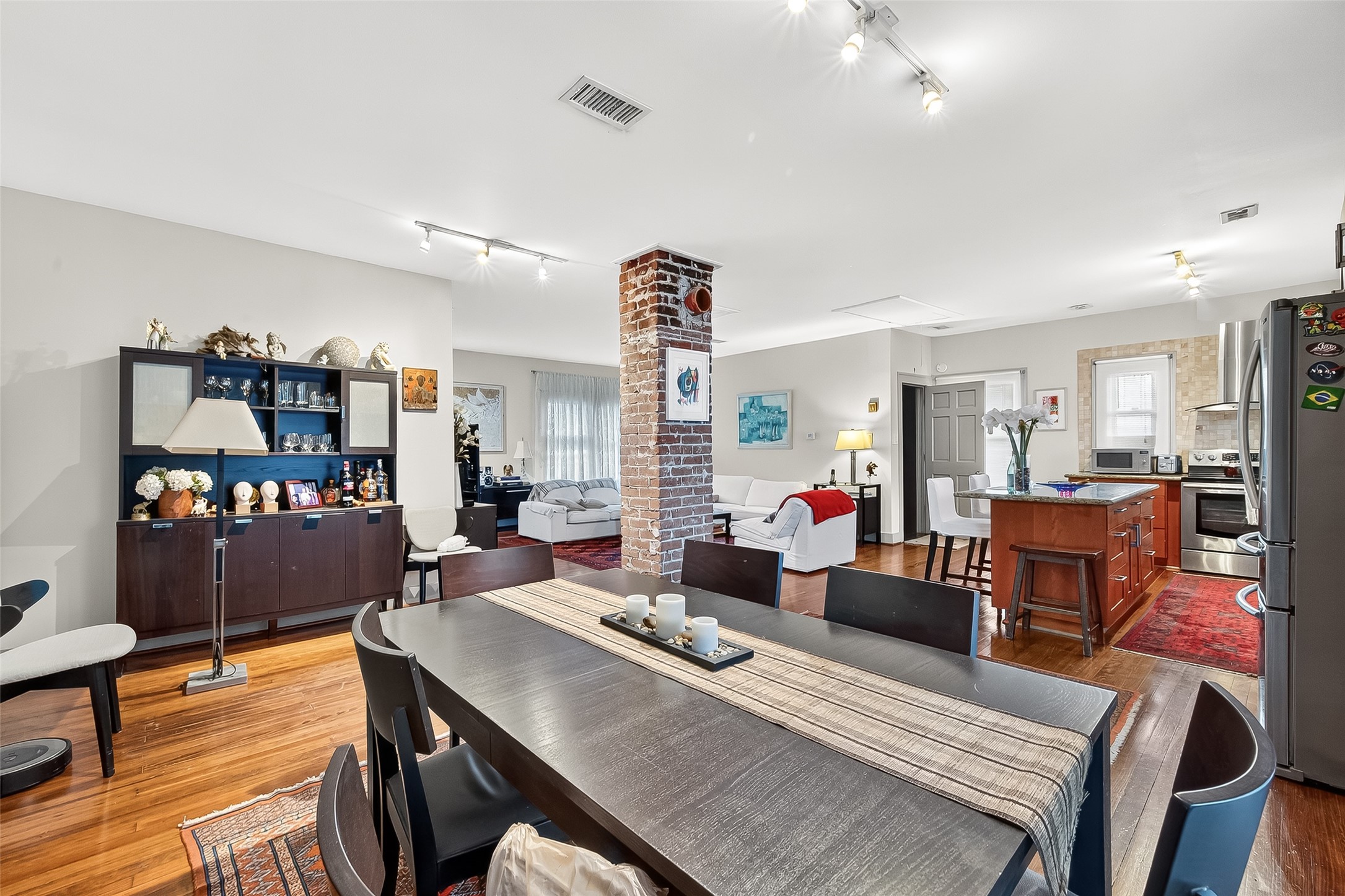 1612 West Alabama Street, Unit ABCD Houston, TX 77006 - Photo 34 of 50 a living room with lots of furniture and kitchen view
