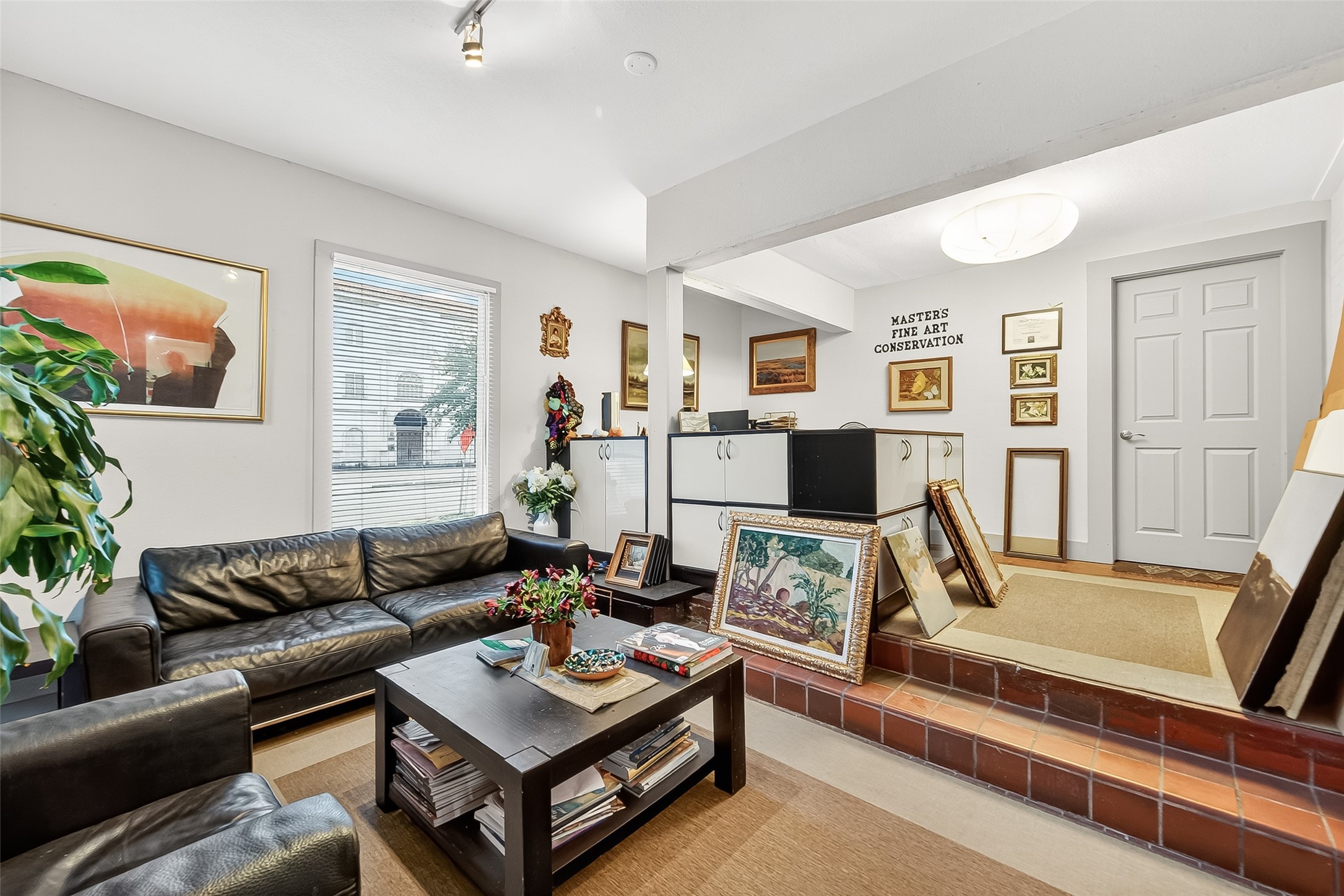 1612 West Alabama Street, Unit ABCD Houston, TX 77006 - Photo 42 of 50 a living room with furniture and a flat screen tv