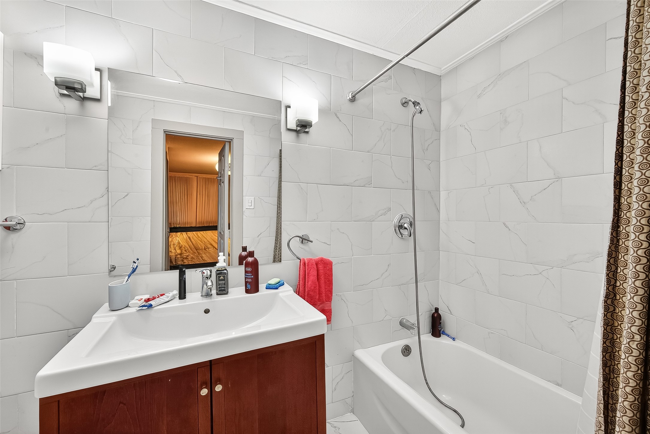 1612 West Alabama Street, Unit ABCD Houston, TX 77006 - Photo 44 of 50 a bathroom with a sink vanity tub and shower