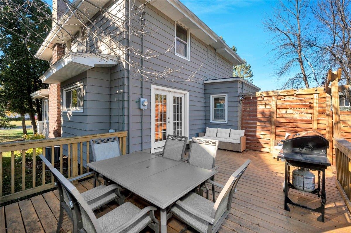 1822 Vermilion Road Duluth, MN 55803 - Photo 23 of 33 Deck featuring a grill, outdoor dining area, an outdoor hangout area, and french doors