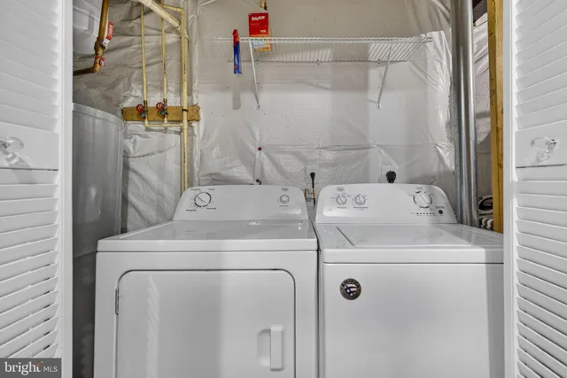 a utility room with dryer and washer