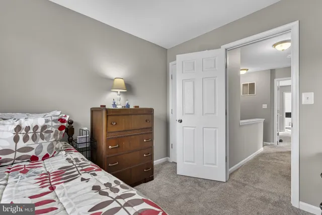 a view of a deck with couches and wooden floor