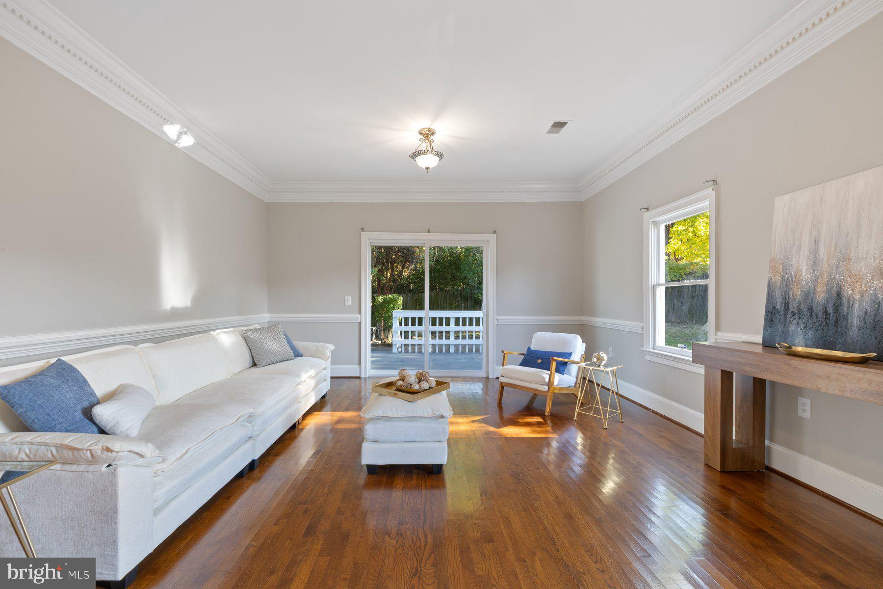 7005 Beacon Light Road Riverdale, MD 20737 - Photo 21 of 45 a living room with furniture and a window