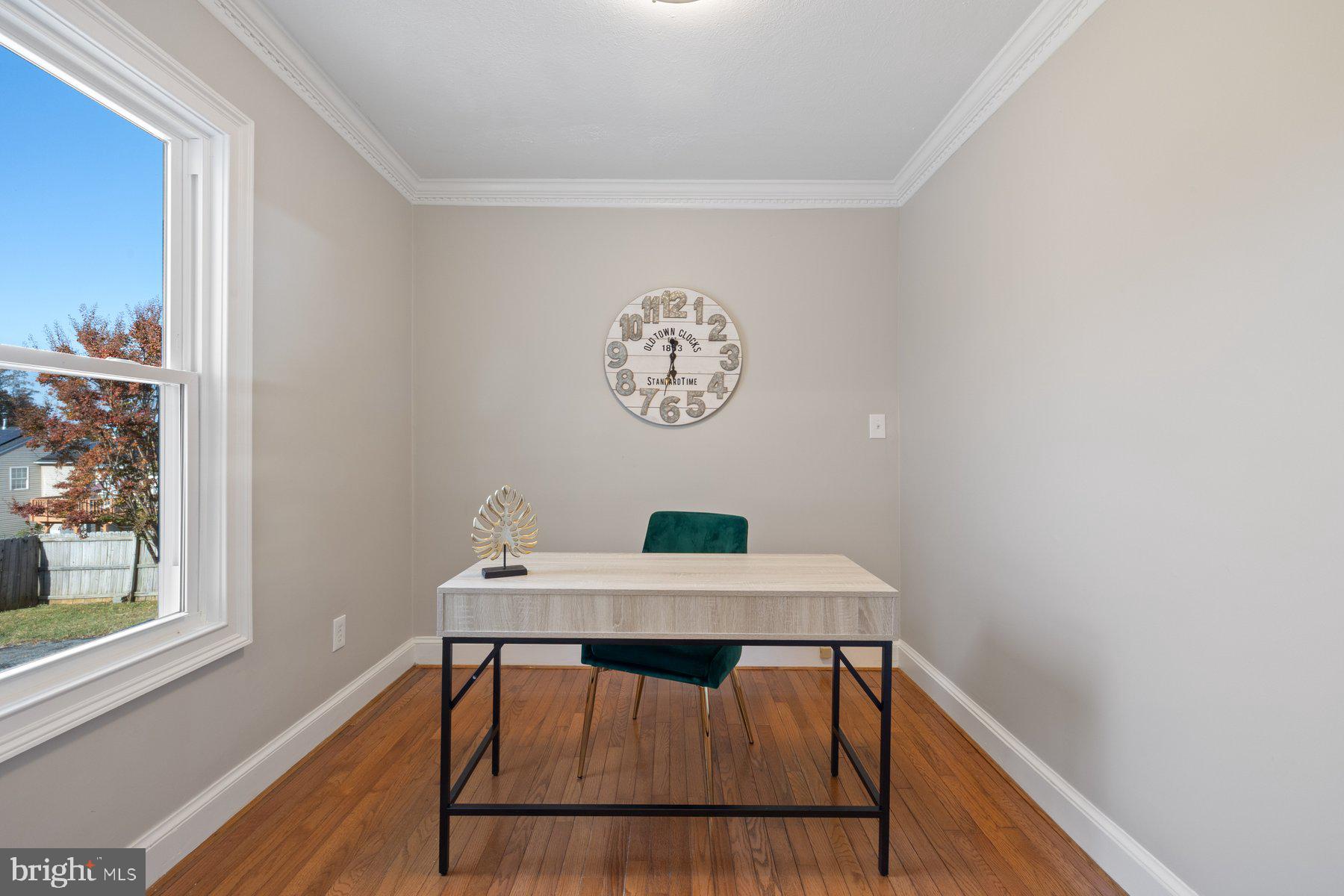 7005 Beacon Light Road Riverdale, MD 20737 - Photo 22 of 45 a view of a workspace with furniture