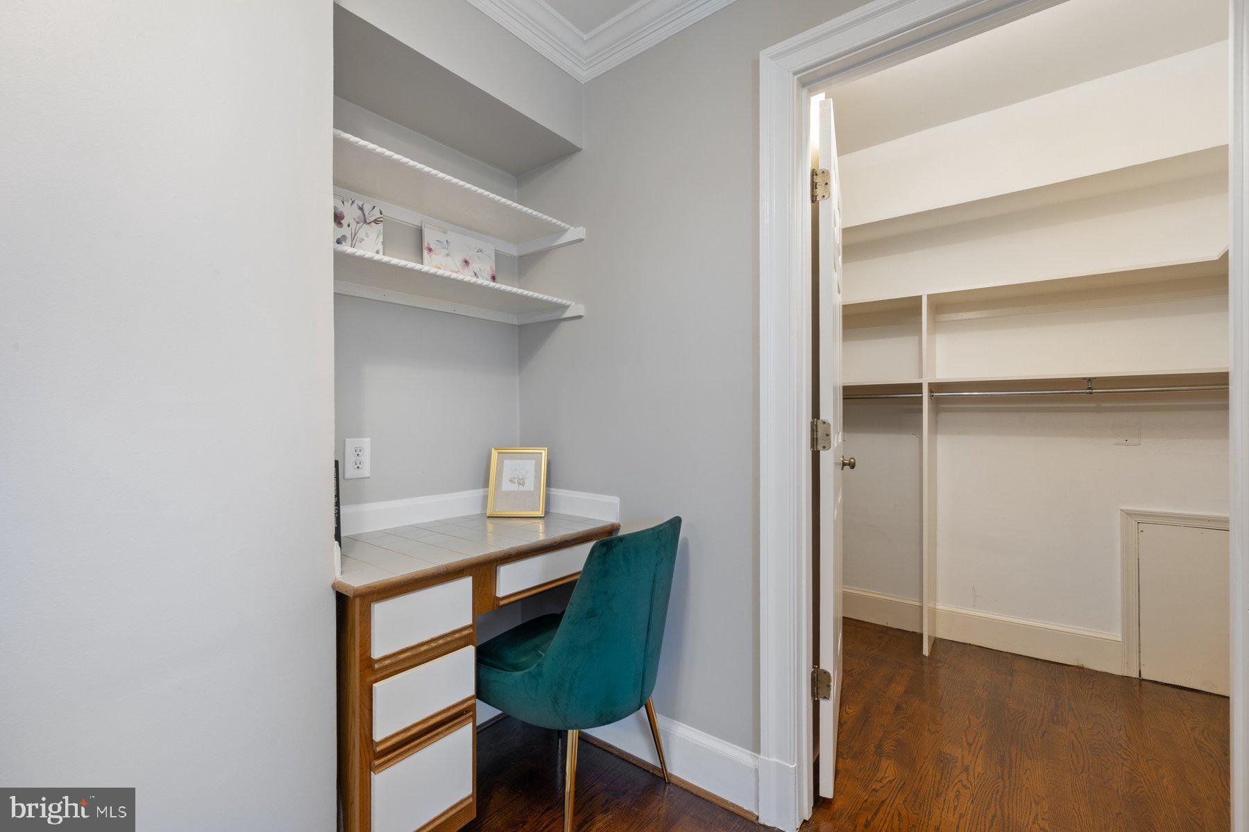 7005 Beacon Light Road Riverdale, MD 20737 - Photo 23 of 45 a workspace with furniture and wooden floor