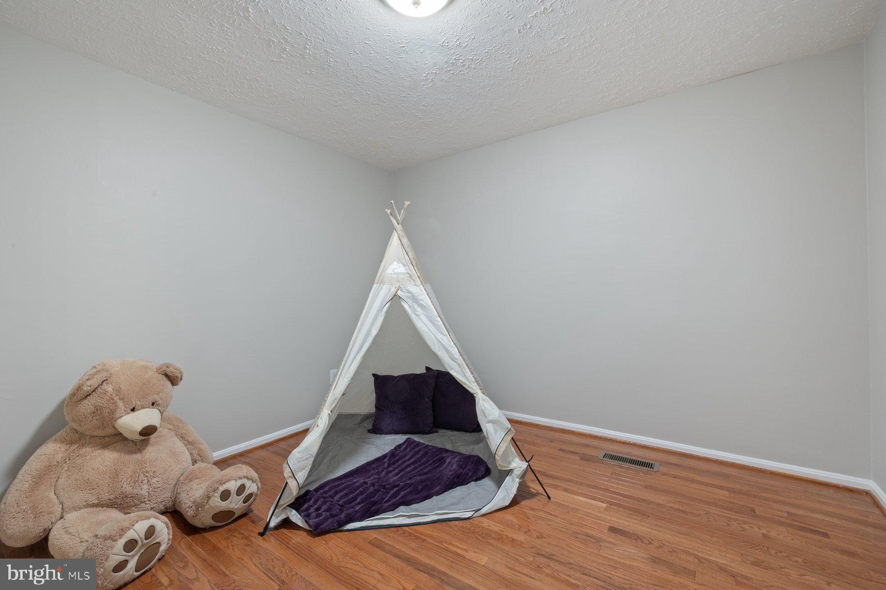 7005 Beacon Light Road Riverdale, MD 20737 - Photo 29 of 45 a view of livingroom with wooden floor