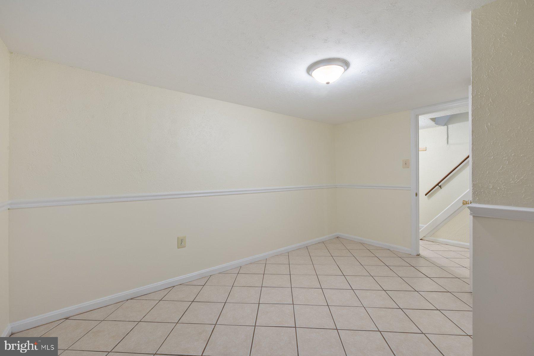 7005 Beacon Light Road Riverdale, MD 20737 - Photo 37 of 45 a view of an empty room