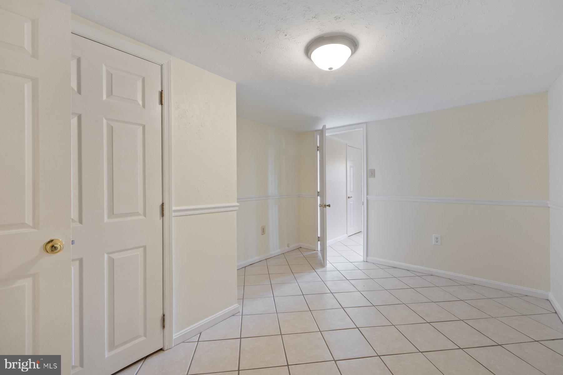 7005 Beacon Light Road Riverdale, MD 20737 - Photo 38 of 45 a view of an empty room