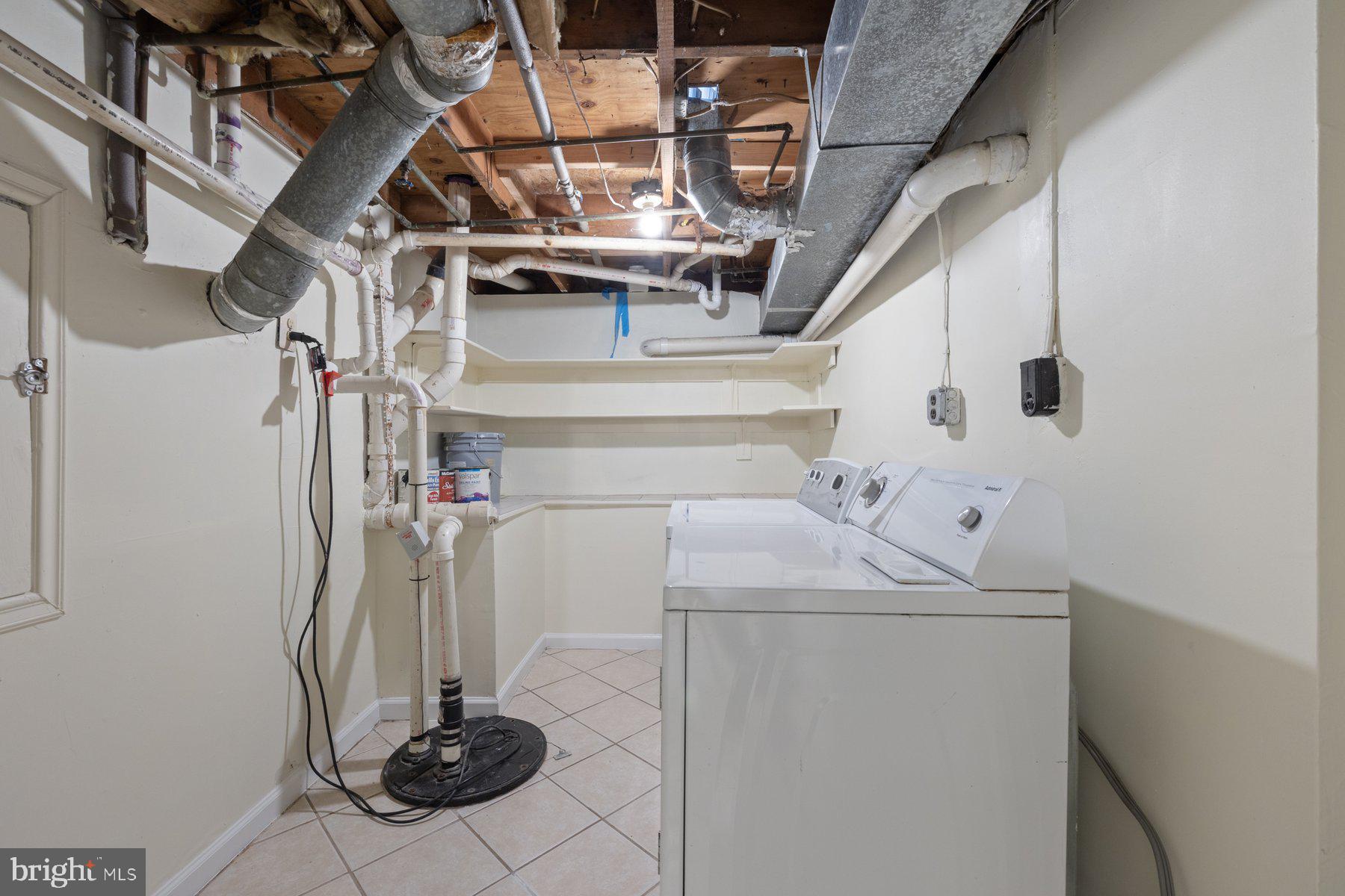7005 Beacon Light Road Riverdale, MD 20737 - Photo 43 of 45 a utility room with dryer and washer