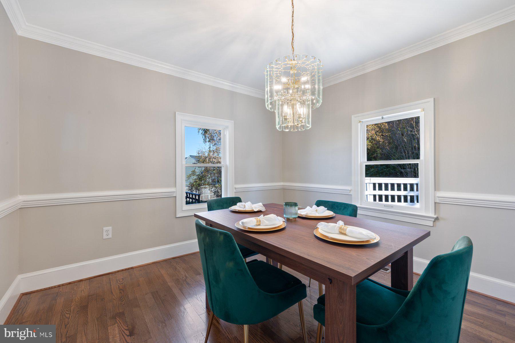 7005 Beacon Light Road Riverdale, MD 20737 - Photo 5 of 45 a view of a dining room with furniture window and wooden floor