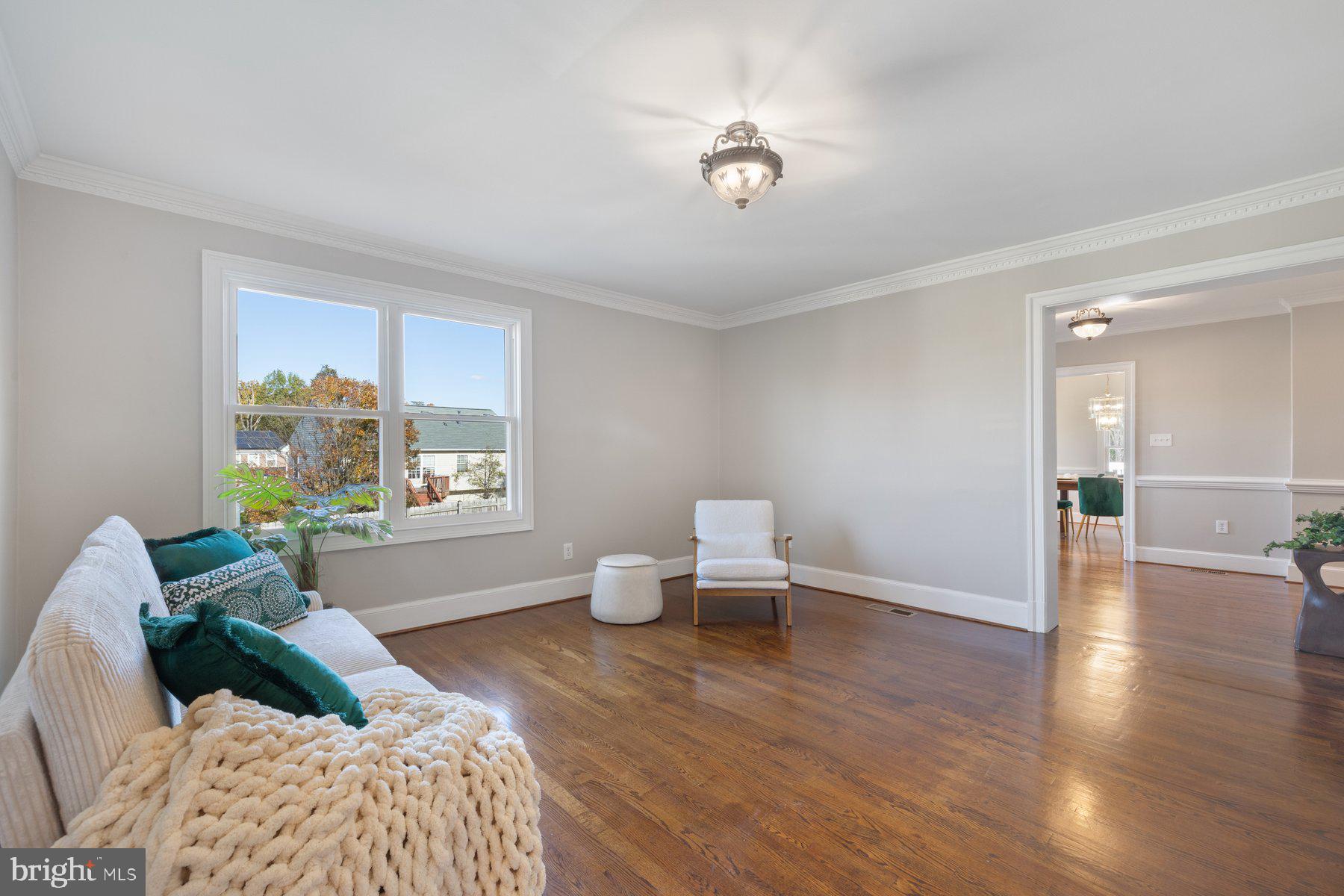 7005 Beacon Light Road Riverdale, MD 20737 - Photo 10 of 45 a living room with furniture and window