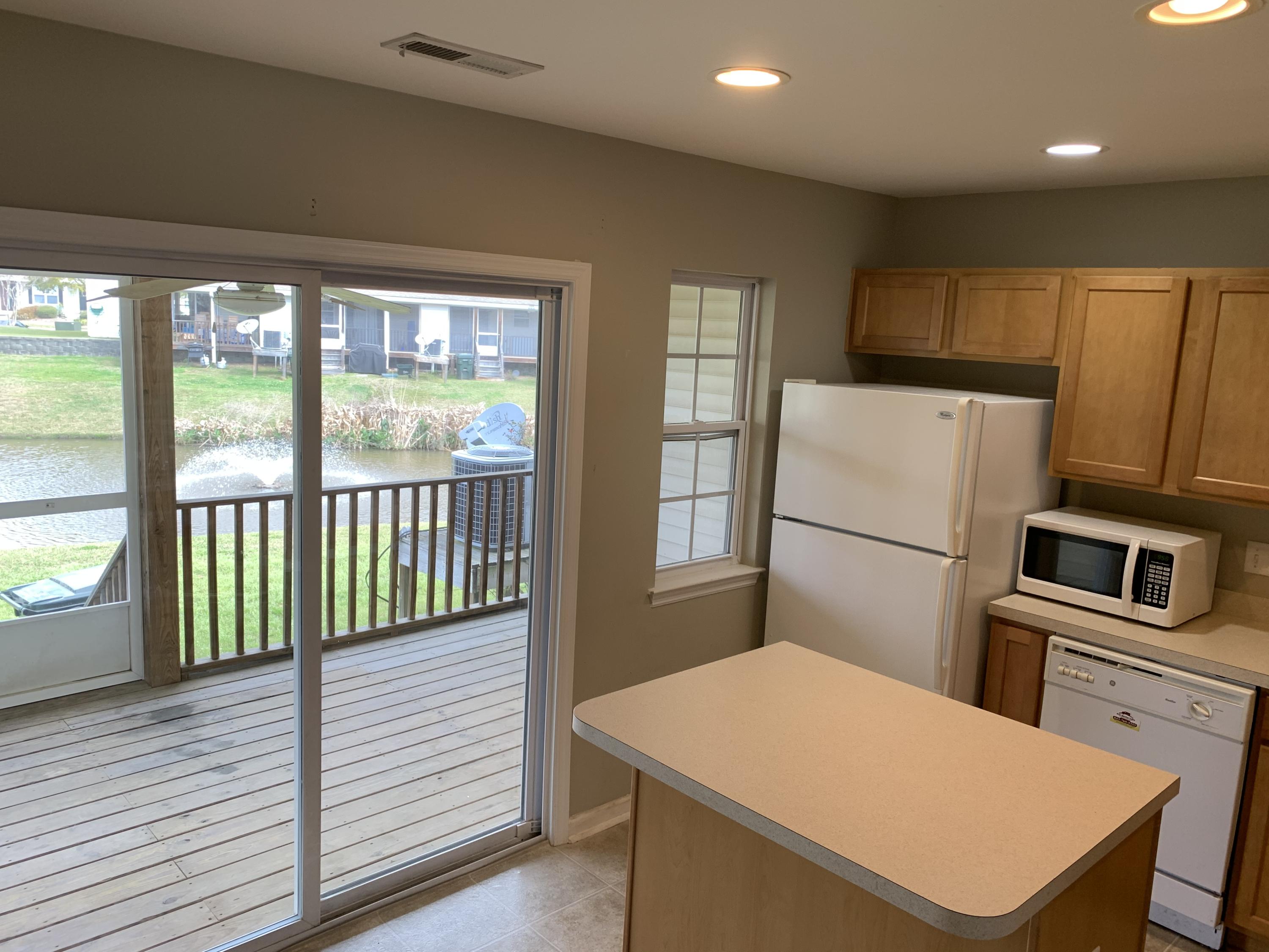 483 Doane Way Wando, SC 29492 - Photo 5 of 16 Kitchen & Porch