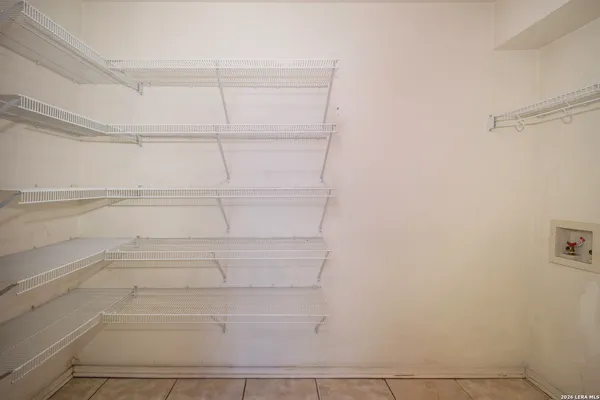 a view of an empty walk in closet