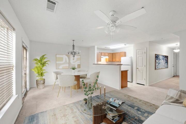 361 Crooked Pine Trail Crestview, FL 32539 - Photo 4 of 14 a living room with furniture a table and wooden floor