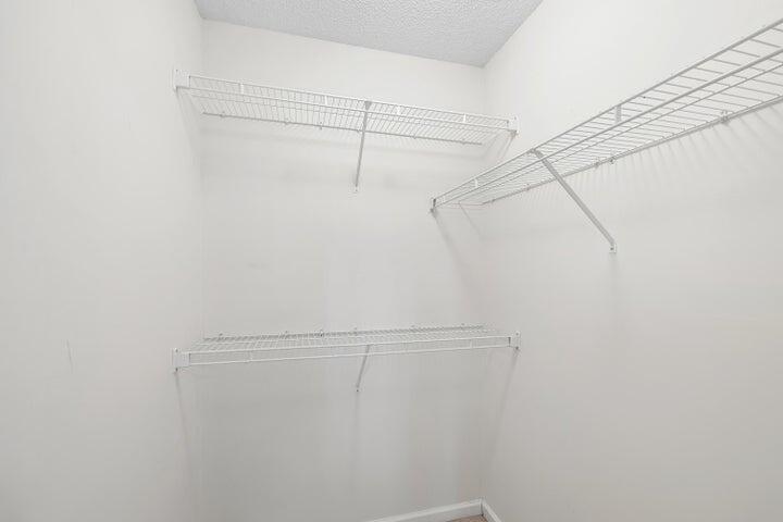 361 Crooked Pine Trail Crestview, FL 32539 - Photo 8 of 14 a view of a room with racks on the wall