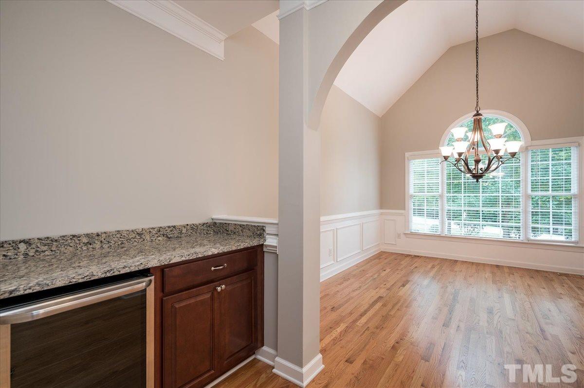 5245 Bartons Enclave Lane Raleigh, NC 27613 - Photo 8 of 27 Granite Countertop and complete with Wine Refrigerator. Adjacent to large Dining Room