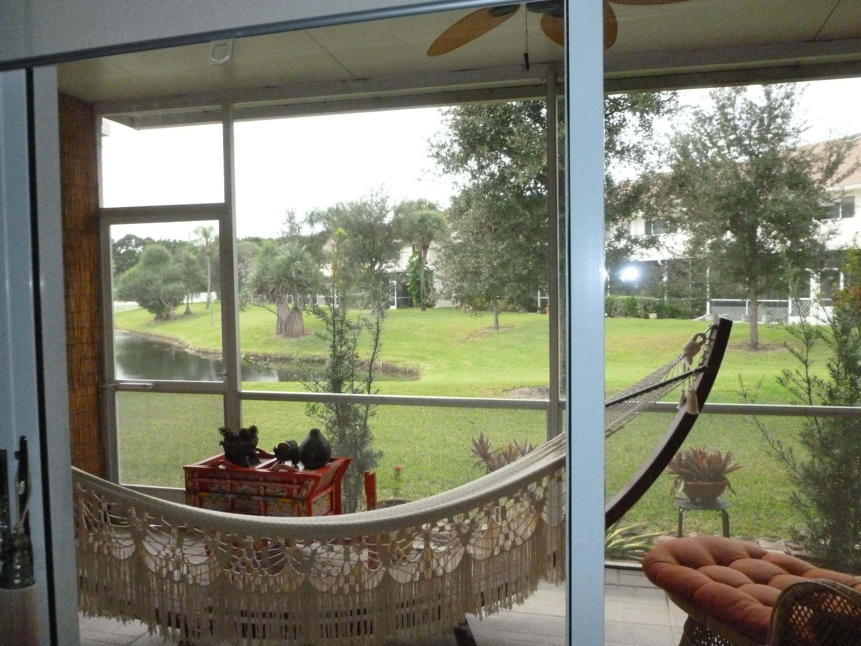 6053 Old Court Road, Unit 303 Boca Raton, FL 33433 - Photo 3 of 23 a view of a balcony and floor to ceiling windows
