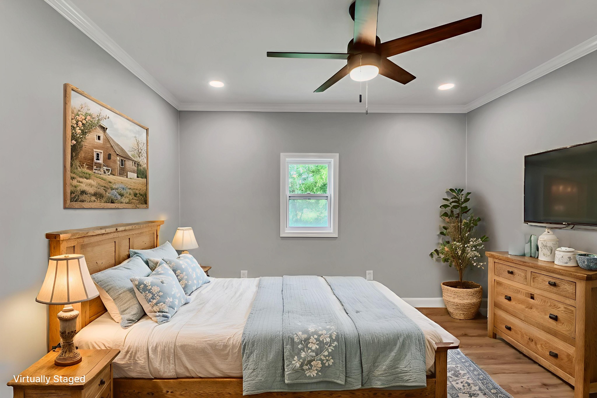 325 Francis Road Decherd, TN 37324 - Photo 9 of 27 a bedroom with a bed and a flat screen tv