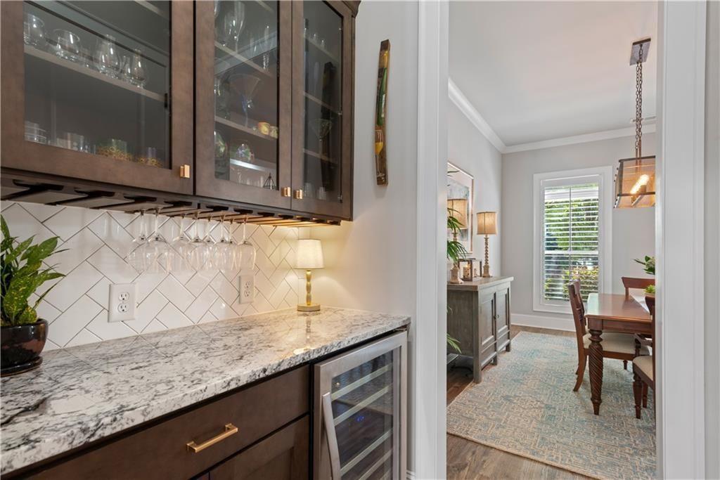 126 Academy Street Alpharetta, GA 30009 - Photo 20 of 74 a kitchen with granite countertop lots of counter top space and furniture