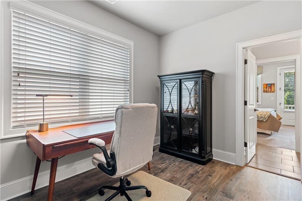 126 Academy Street Alpharetta, GA 30009 - Photo 51 of 74 a view of a workspace with furniture and a window