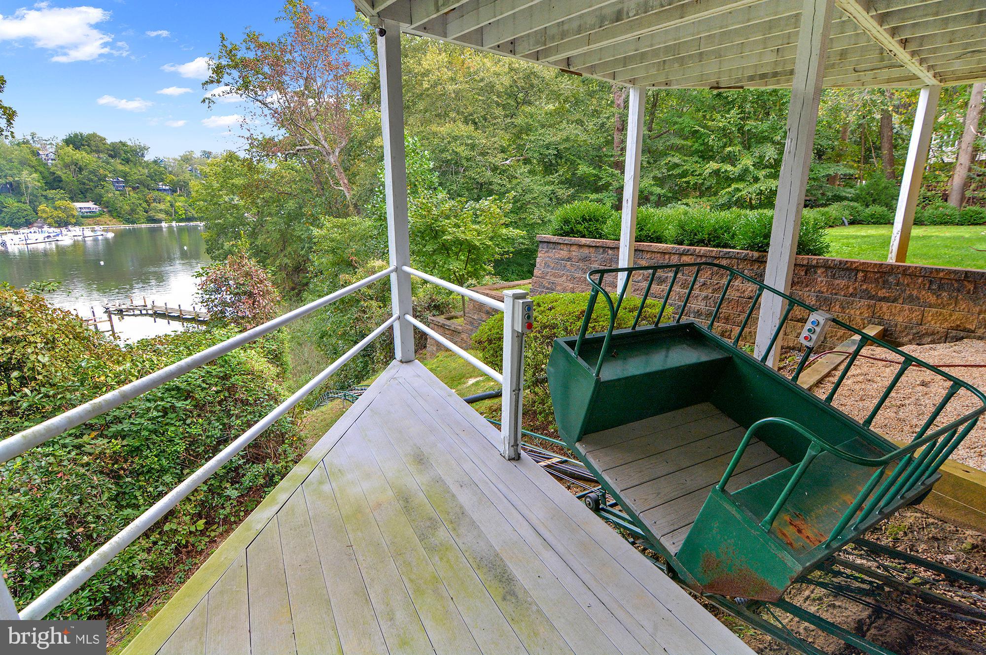 856 St Edmonds Place Annapolis, MD 21401 - Photo 116 of 129 a view of a balcony with floor to ceiling windows with wooden floor