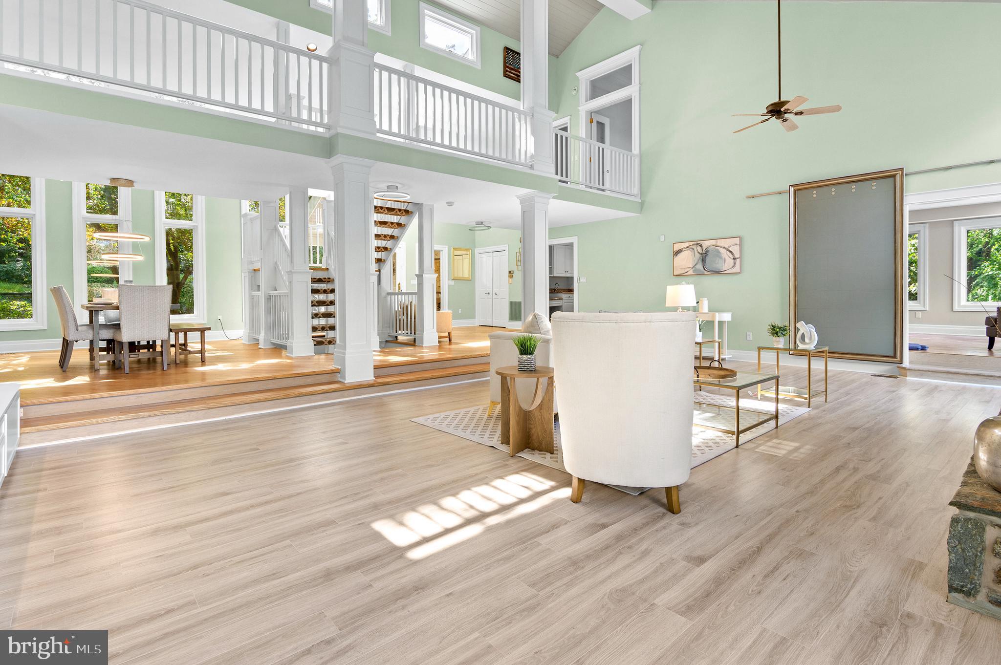 856 St Edmonds Place Annapolis, MD 21401 - Photo 25 of 129 a living room with furniture and large windows