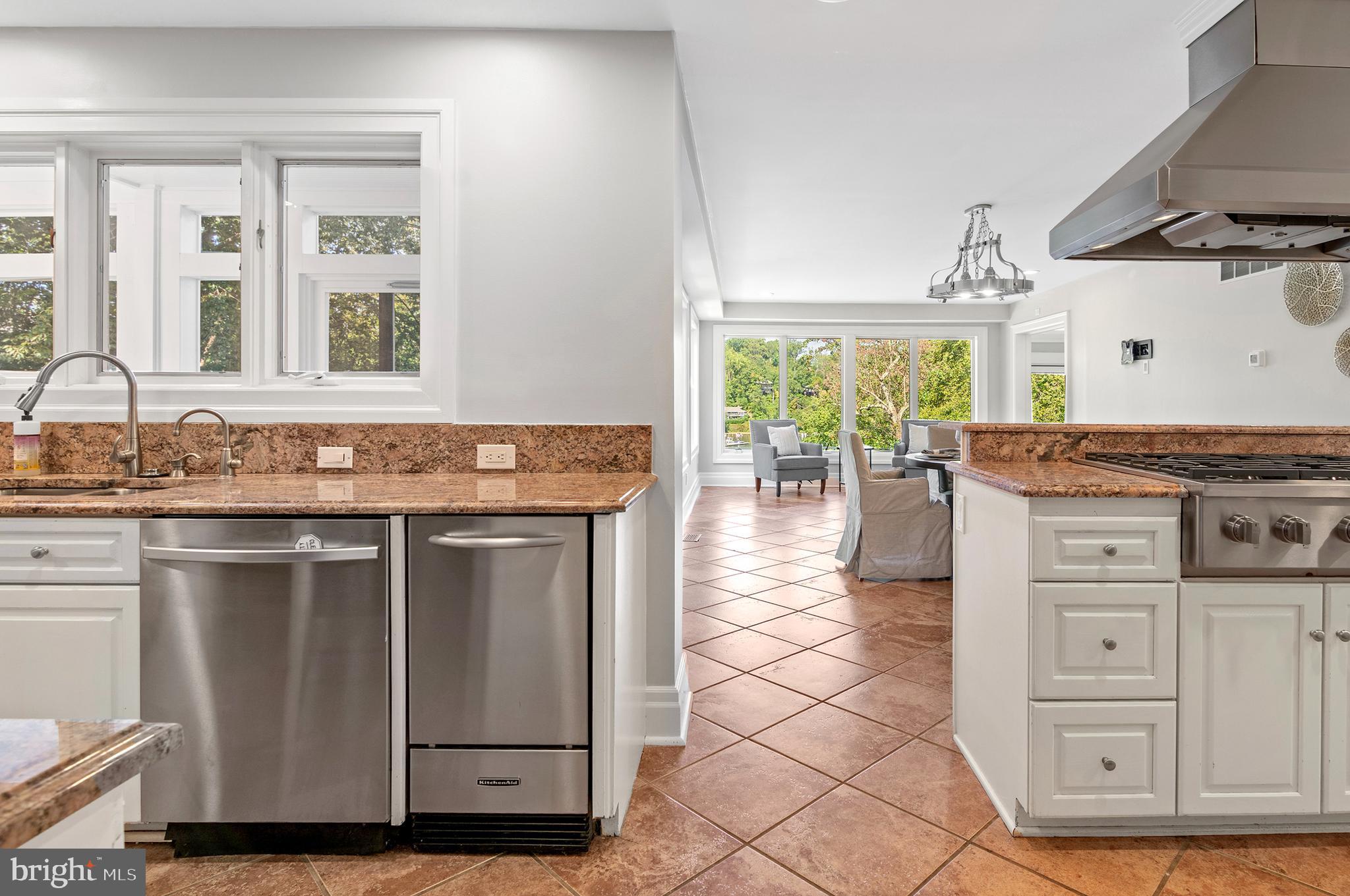 856 St Edmonds Place Annapolis, MD 21401 - Photo 45 of 129 a kitchen with granite countertop a stove and a sink
