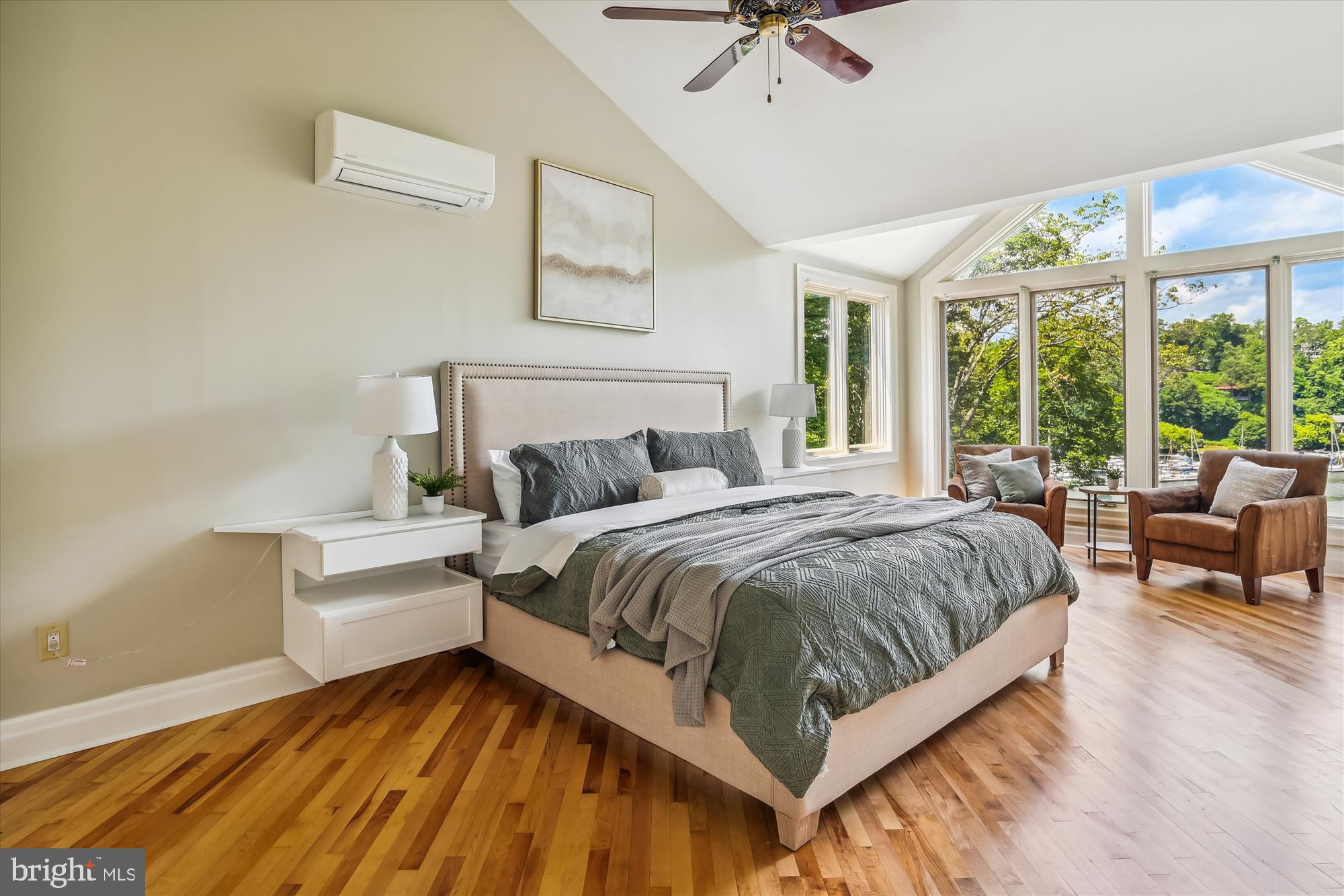 856 St Edmonds Place Annapolis, MD 21401 - Photo 57 of 129 a spacious bedroom with a bed and glass windows