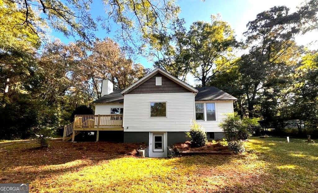 a view of a house with a swimming pool