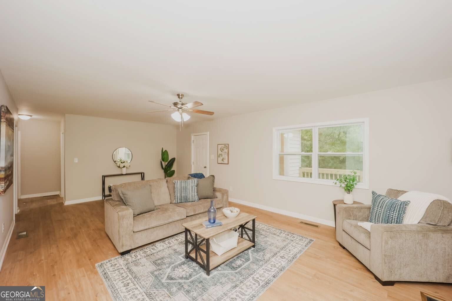 221 Power Plant Road Hogansville, GA 30230 - Photo 2 of 14 a living room with furniture and a large window