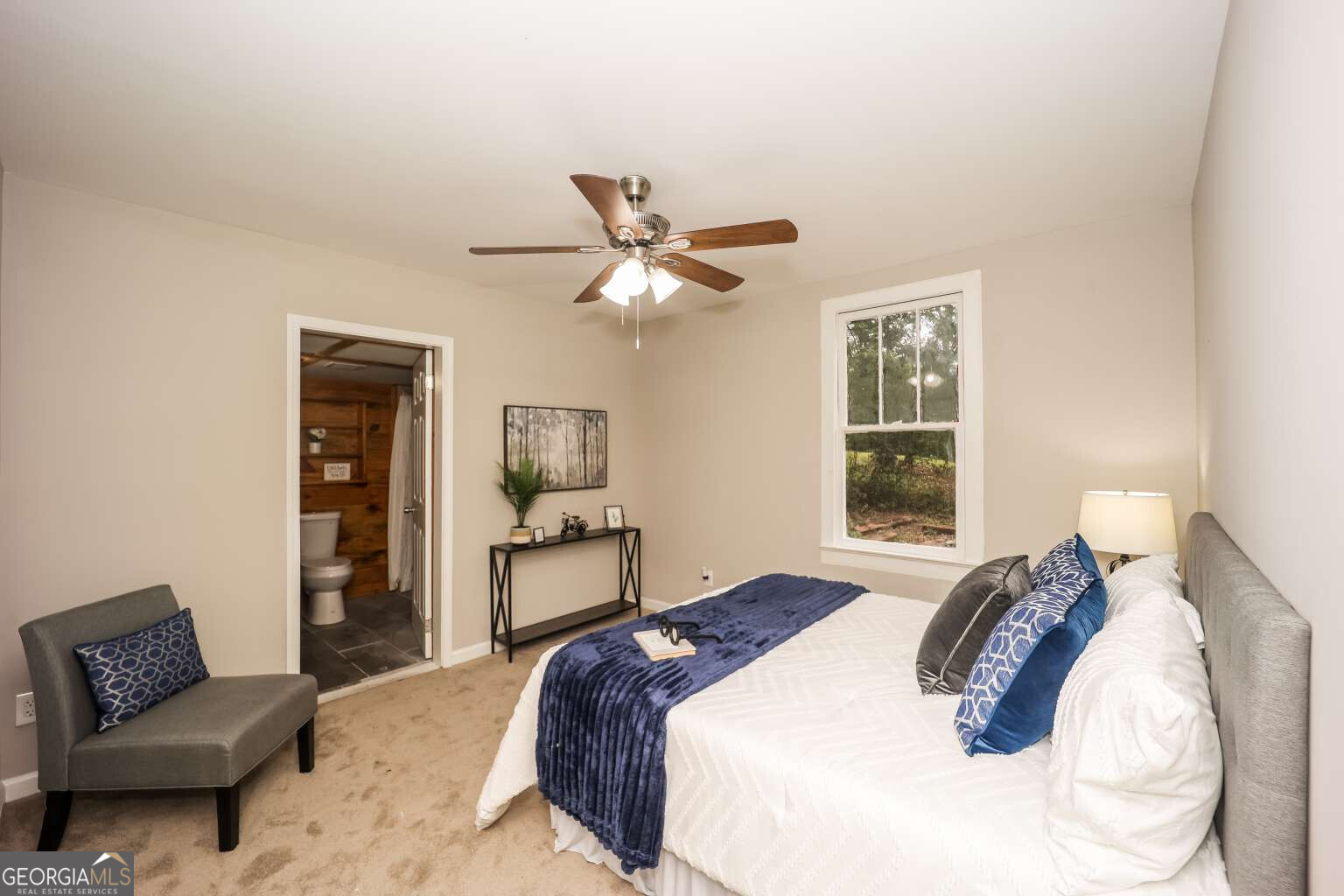 221 Power Plant Road Hogansville, GA 30230 - Photo 7 of 14 a bedroom with a bed and dresser