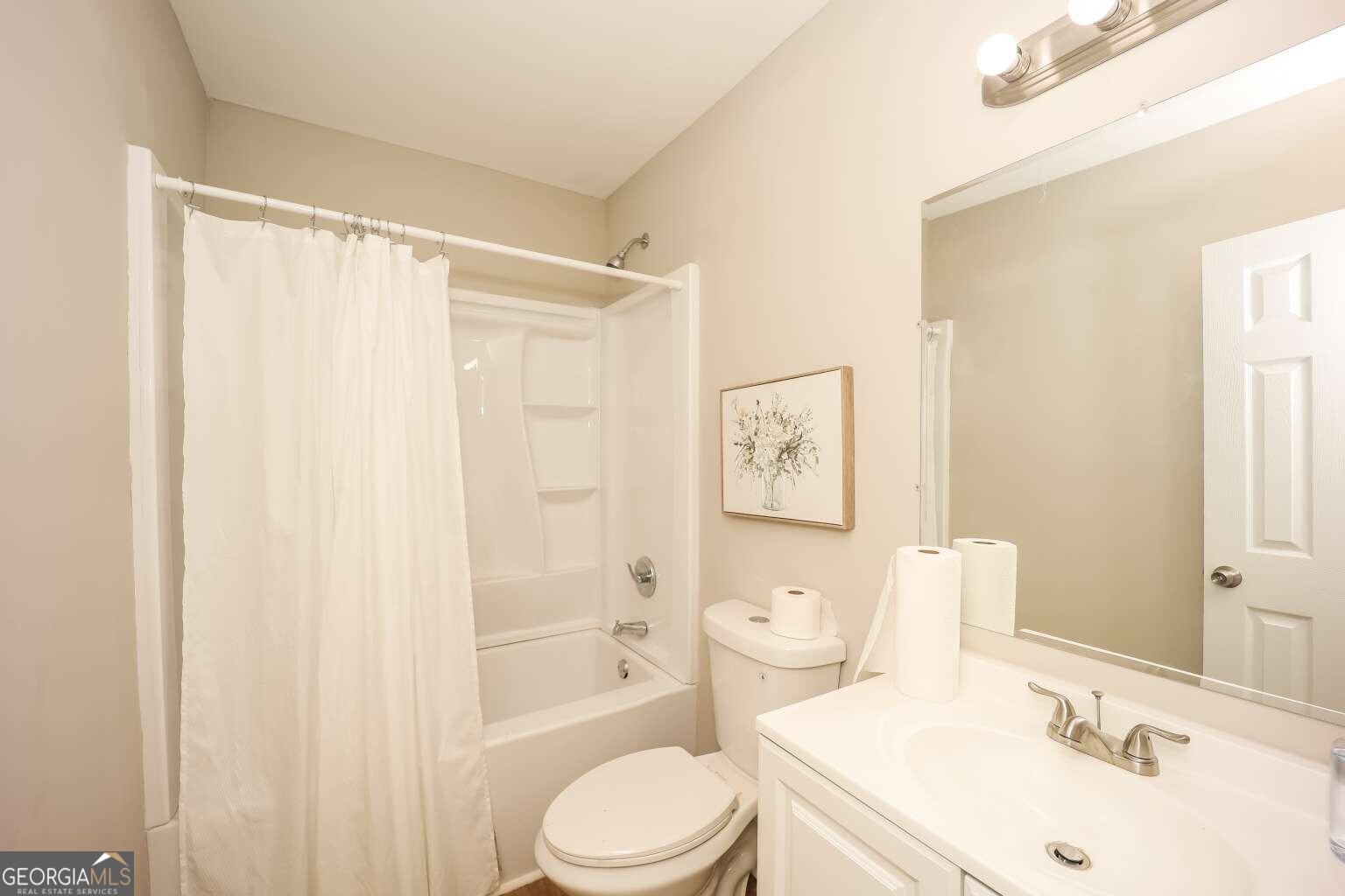 221 Power Plant Road Hogansville, GA 30230 - Photo 10 of 14 a bathroom with a sink toilet and shower