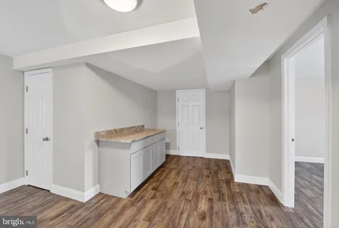 a view of entryway with wooden floor
