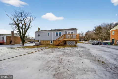 a view of field with trees in the background