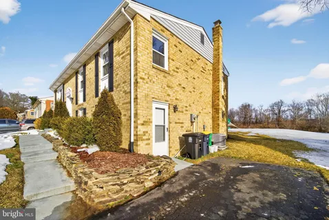 a view of swimming pool with a patio