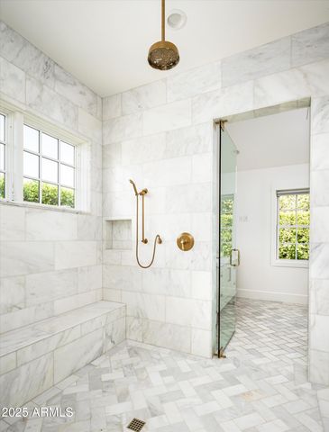 a view of a hallway with windows