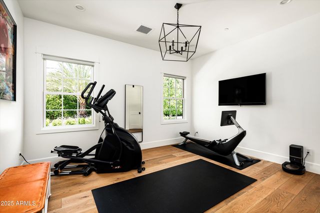 a view of a patio with chairs and table in a patio