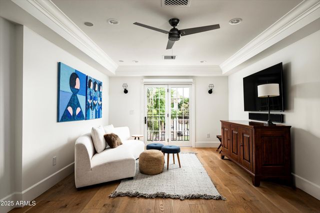 a view of a house with swimming pool and porch with furniture