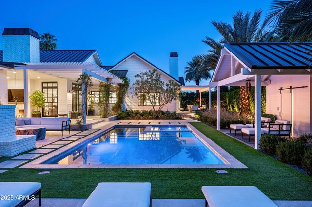 an aerial view of house with a yard