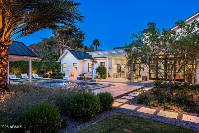 an aerial view of residential houses with a outdoor space