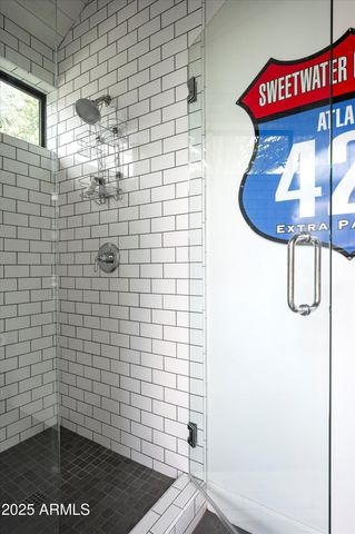 a view of a house with a backyard and porch