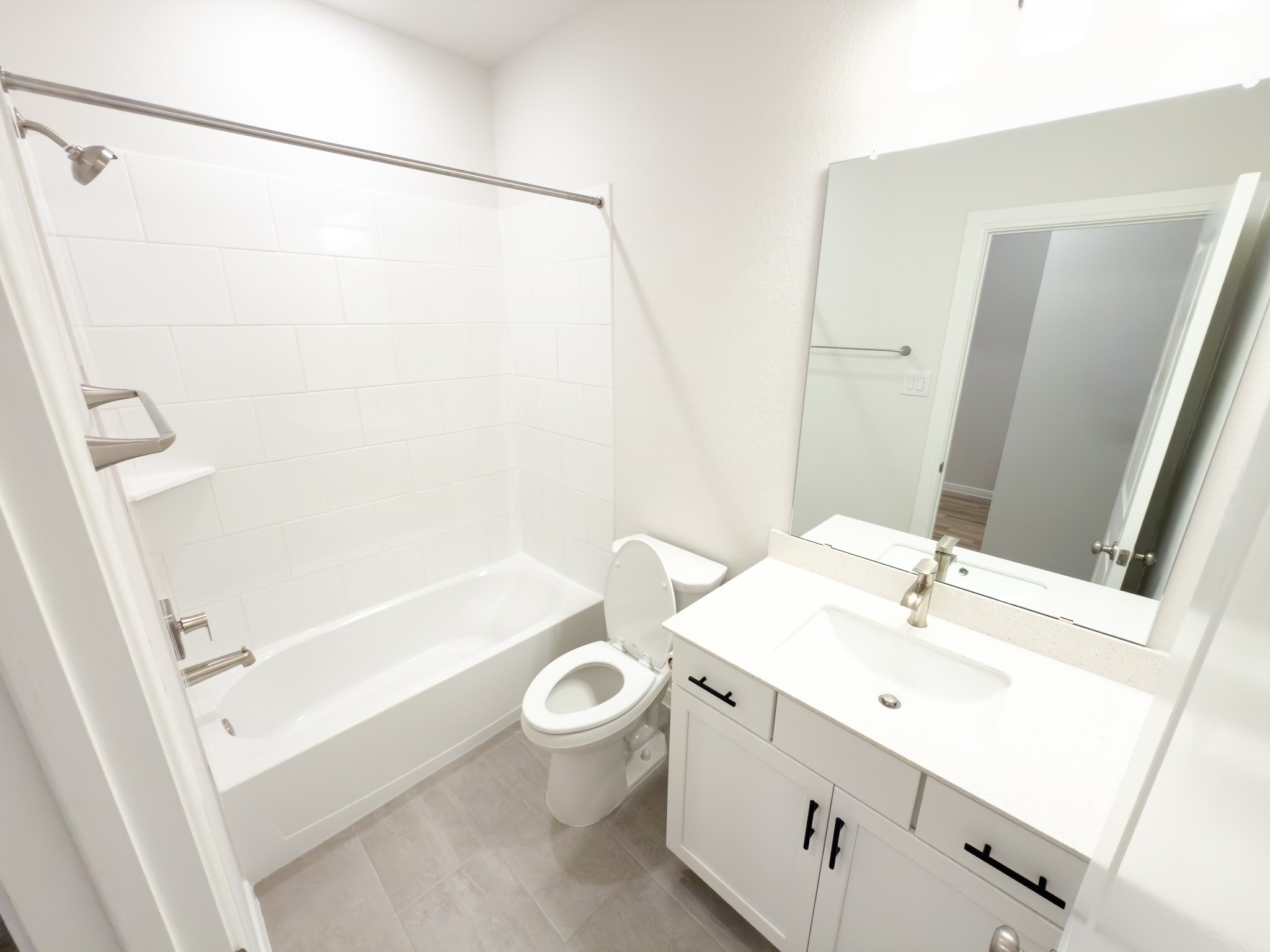 42504 Rustico Road Magnolia, TX 77354 - Photo 16 of 46 a bathroom with a sink a toilet and shower