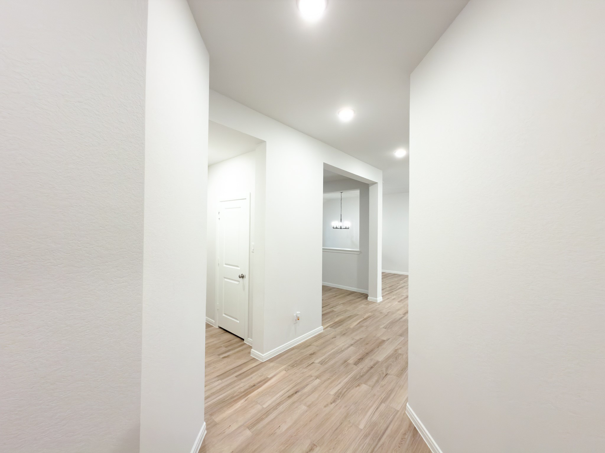 42504 Rustico Road Magnolia, TX 77354 - Photo 22 of 46 a view of hallway with wooden floor