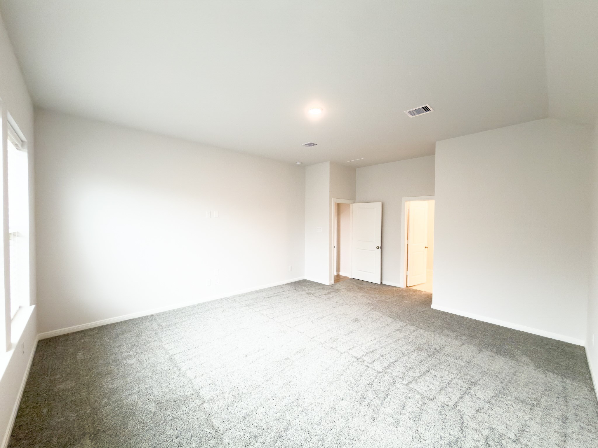 42504 Rustico Road Magnolia, TX 77354 - Photo 31 of 46 an empty room with a natural light