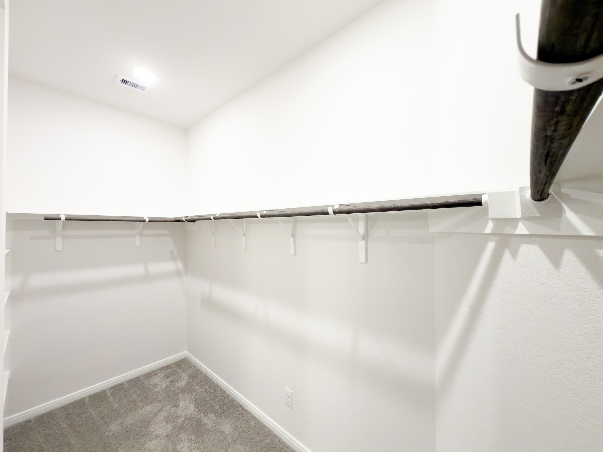 42504 Rustico Road Magnolia, TX 77354 - Photo 36 of 46 a view of a room with racks on the wall