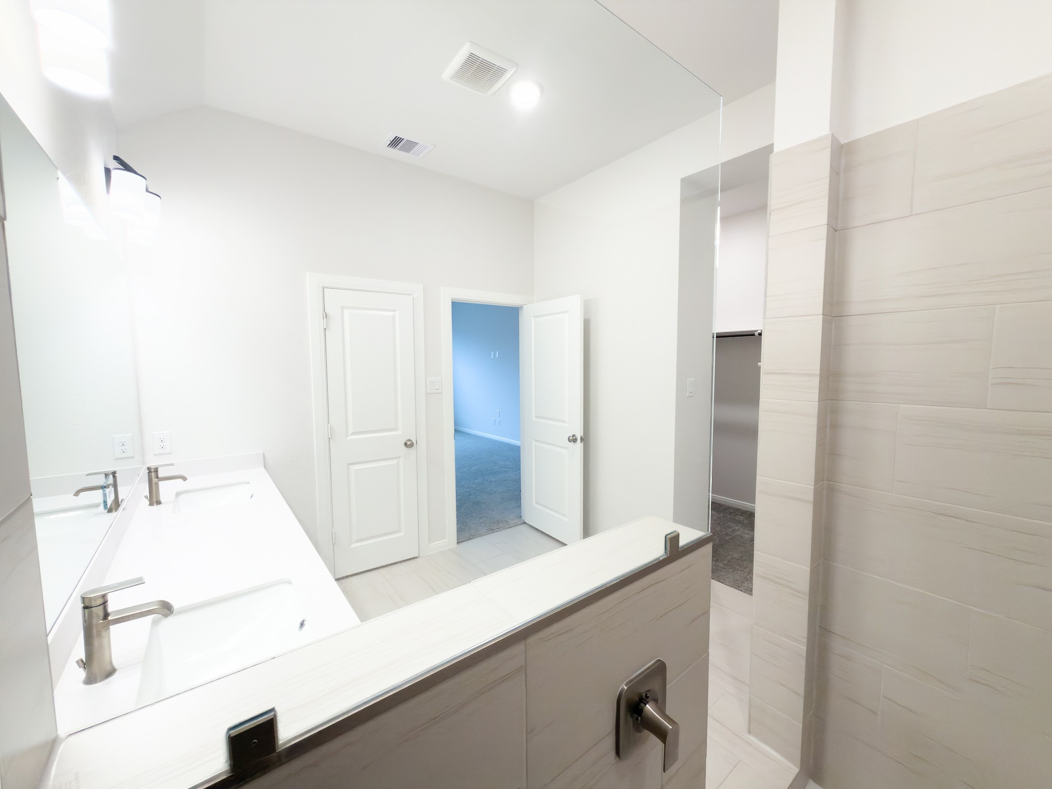 42504 Rustico Road Magnolia, TX 77354 - Photo 37 of 46 a bathroom with a sink and a mirror