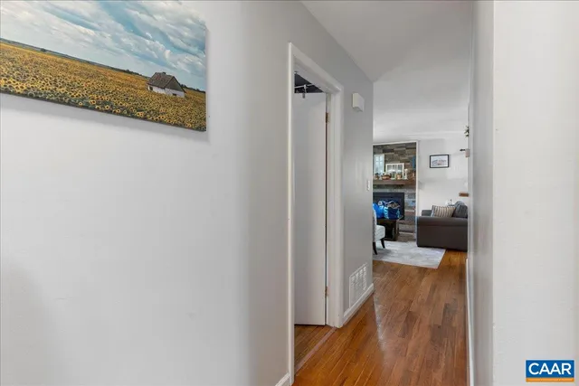 a bathroom with a sink mirror vanity and toilet